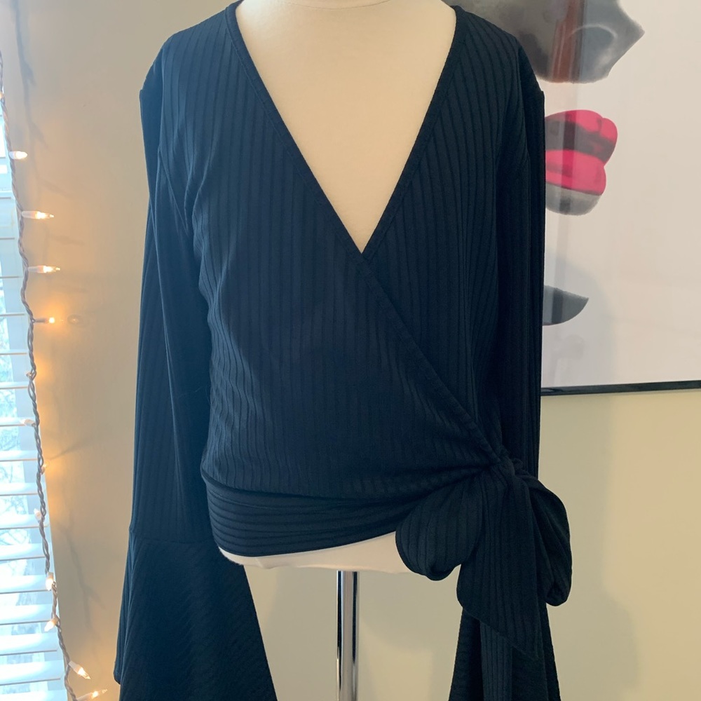 Cropped, bell sleeved, v necked blouse